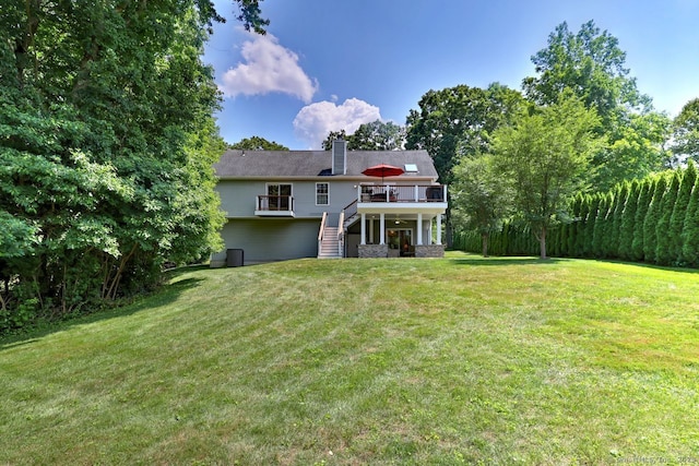 11 Parlor Rock Rd, Trumbull, CT 06611 - rear view of property with stairs, a deck, a lawn, and a chimney