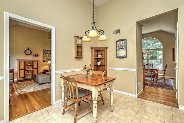 11 Parlor Rock Rd, Trumbull, CT 06611 - dining space featuring a wainscoted wall, light wood finished floors, and high vaulted ceiling