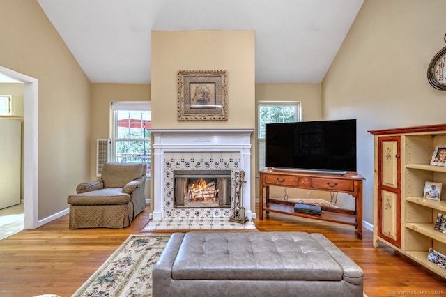 11 Parlor Rock Rd, Trumbull, CT 06611 - living room featuring wood finished floors, a fireplace, plenty of natural light, and lofted ceiling
