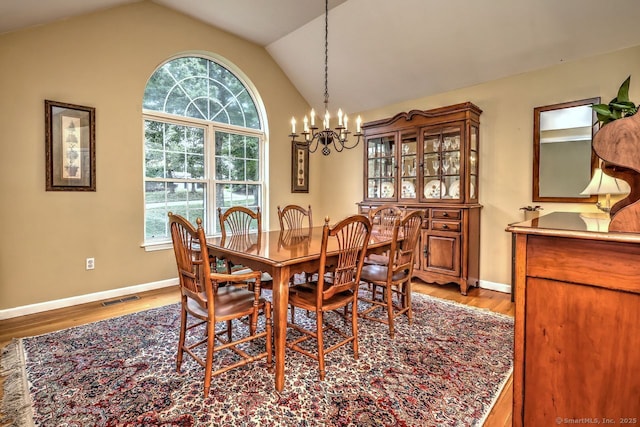 11 Parlor Rock Rd, Trumbull, CT 06611 - dining space with a chandelier, wood finished floors, and vaulted ceiling