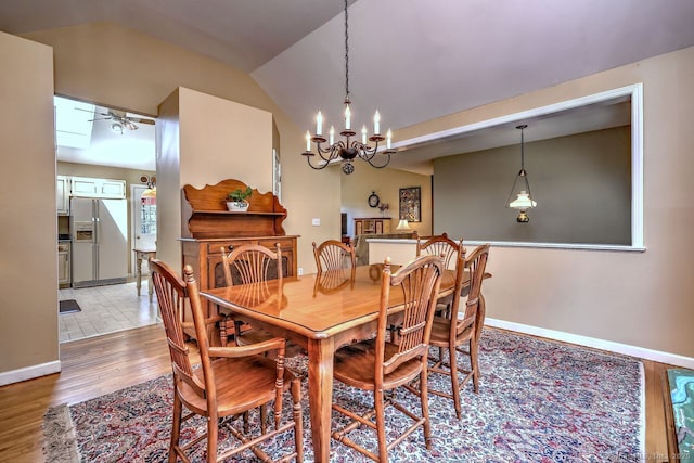 11 Parlor Rock Rd, Trumbull, CT 06611 - dining area featuring light wood-style flooring, ceiling fan, vaulted ceiling, and a chandelier