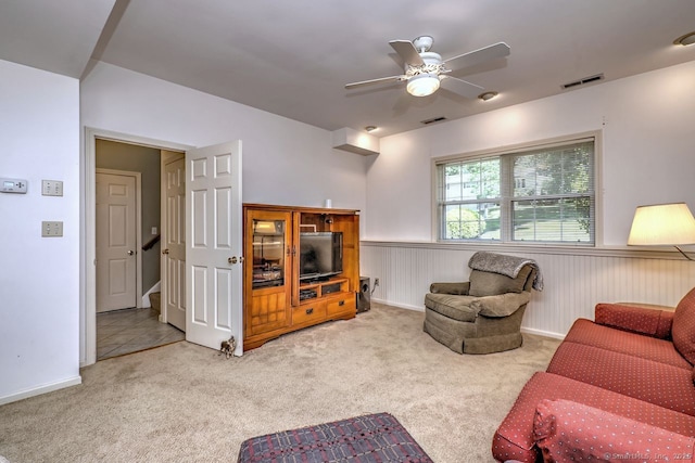 11 Parlor Rock Rd, Trumbull, CT 06611 - living room featuring wainscoting, a ceiling fan, carpet flooring, and stairway