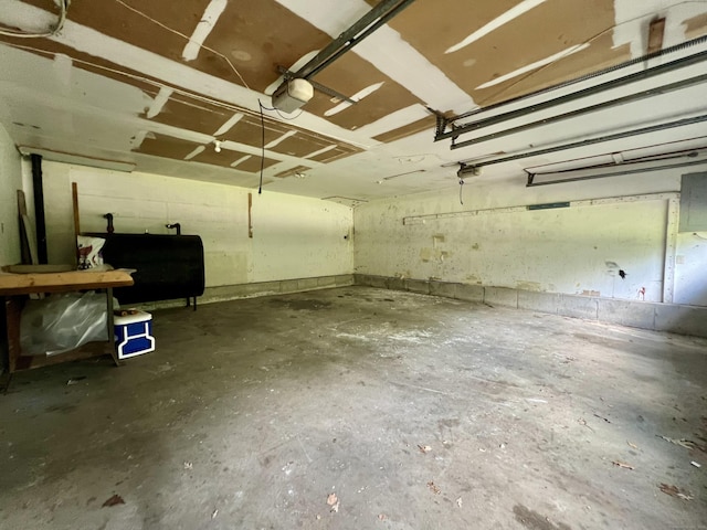 67 Harold Rd, Farmington, CT 06032 - garage with oil tank and a garage door opener