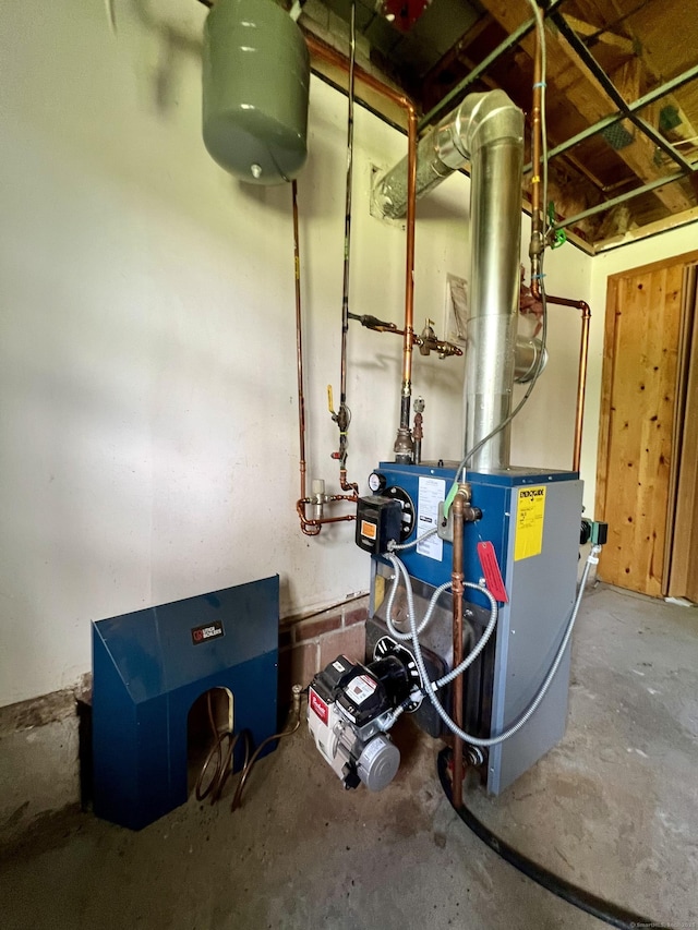 67 Harold Rd, Farmington, CT 06032 - utility room featuring a heating unit