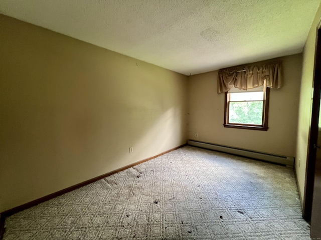 67 Harold Rd, Farmington, CT 06032 - carpeted spare room with baseboard heating and a textured ceiling