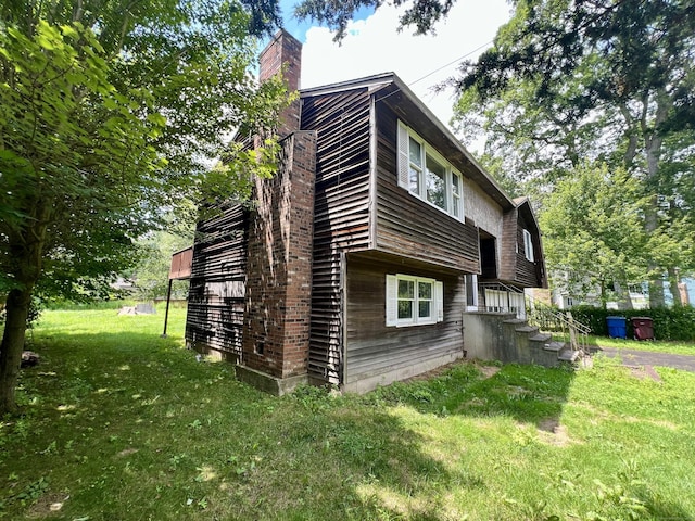 67 Harold Rd, Farmington, CT 06032 - view of property exterior with a chimney and a yard