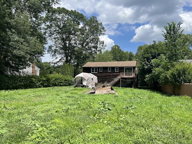 67 Harold Rd, Farmington, CT 06032 - view of yard featuring a wooden deck and stairway