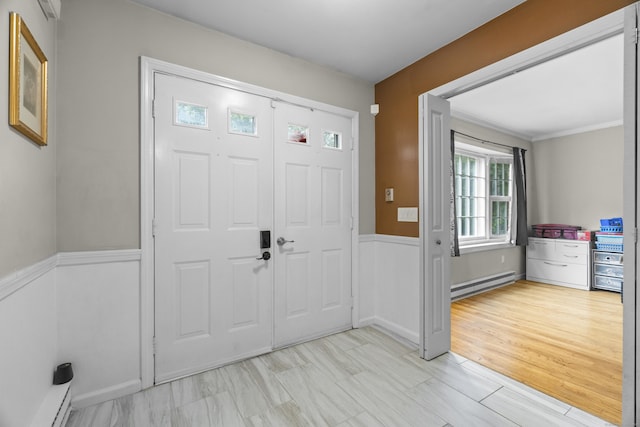 2 Judith Dr, Danbury, CT 06811 - entrance foyer with a baseboard heating unit and wainscoting