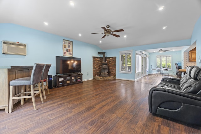 2 Judith Dr, Danbury, CT 06811 - living area featuring a ceiling fan, a wall mounted air conditioner, wood finished floors, a wood stove, and recessed lighting
