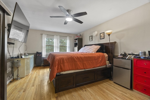 2 Judith Dr, Danbury, CT 06811 - bedroom with light wood-type flooring, a ceiling fan, and fridge