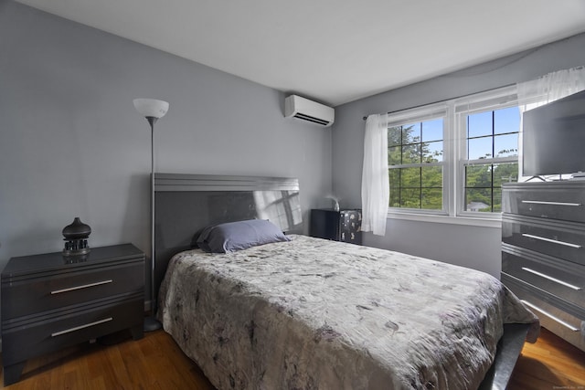 2 Judith Dr, Danbury, CT 06811 - bedroom featuring an AC wall unit and dark wood-style floors