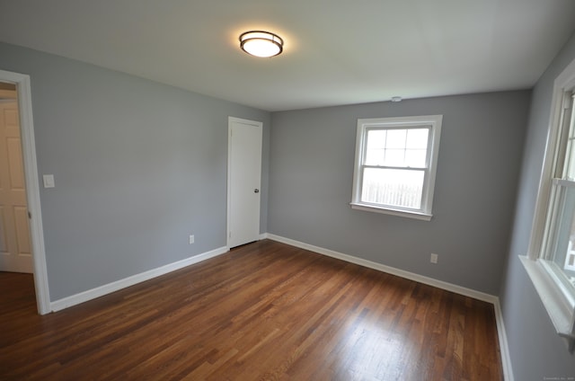 51 Grandview Ave, Norwalk, CT 06850 - unfurnished room with baseboards and dark wood-style flooring