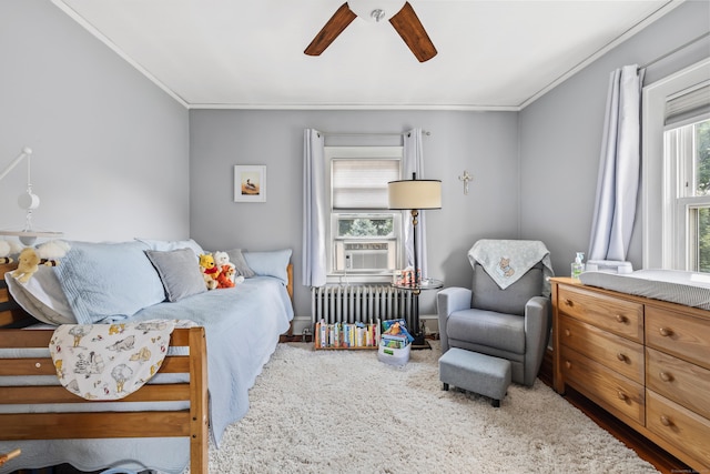 33 Hugh St, West Hartford, CT 06119 - bedroom with radiator, crown molding, and ceiling fan