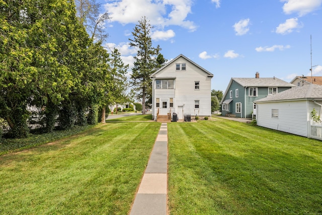 33 Hugh St, West Hartford, CT 06119 - back of property with a yard