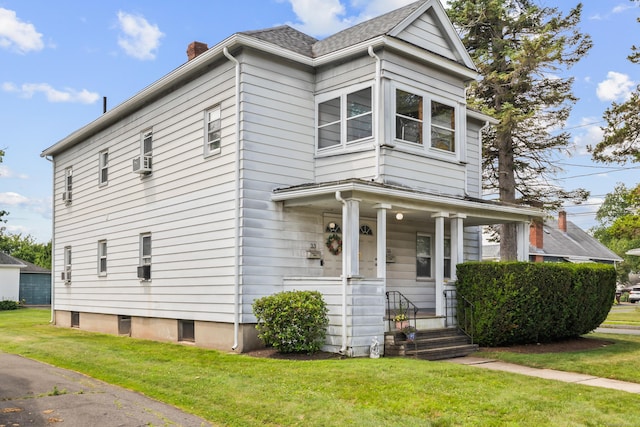 33 Hugh St, West Hartford, CT 06119 - view of front of home featuring a chimney, a front yard, and covered porch