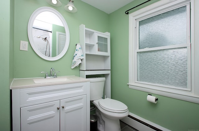 1357 Meriden Ave, Southington, CT 06489 - bathroom with a baseboard heating unit, vanity, and tile patterned floors