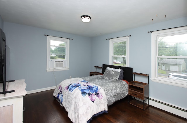 1357 Meriden Ave, Southington, CT 06489 - bedroom featuring wood finished floors, multiple windows, baseboard heating, and cooling unit