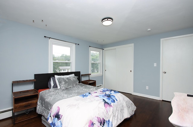 1357 Meriden Ave, Southington, CT 06489 - bedroom with wood finished floors, a closet, and baseboard heating