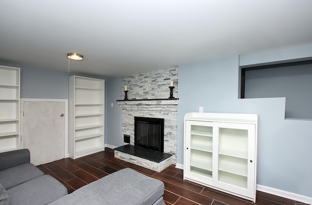 1357 Meriden Ave, Southington, CT 06489 - living area with wood finished floors and a stone fireplace