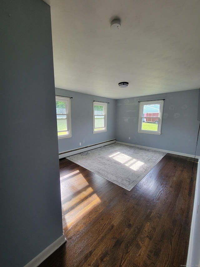 1357 Meriden Ave, Southington, CT 06489 - empty room with a baseboard radiator, wood finished floors, and a smoke detector