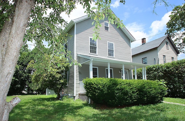5 Golden Hill Ave, Danbury, CT 06811 - view of front of home with a porch and a front lawn