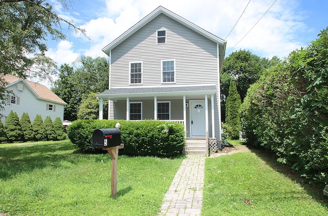 5 Golden Hill Ave, Danbury, CT 06811 - view of front of home with a front lawn and covered porch