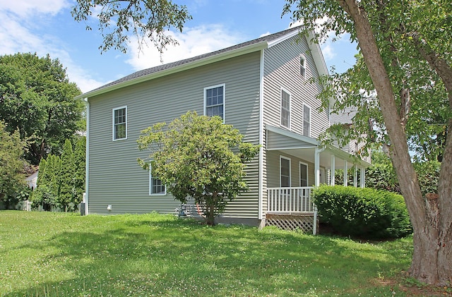 5 Golden Hill Ave, Danbury, CT 06811 - view of home's exterior with a porch and a lawn