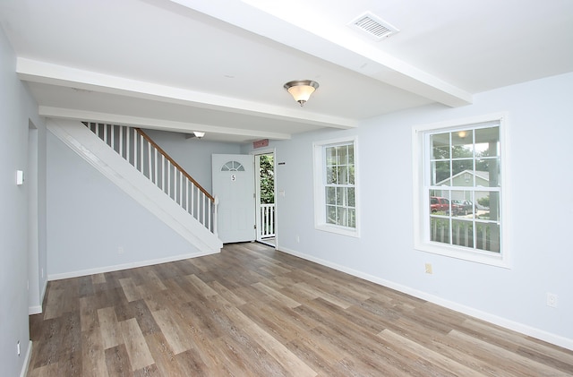 5 Golden Hill Ave, Danbury, CT 06811 - foyer with stairway, plenty of natural light, beam ceiling, and wood finished floors