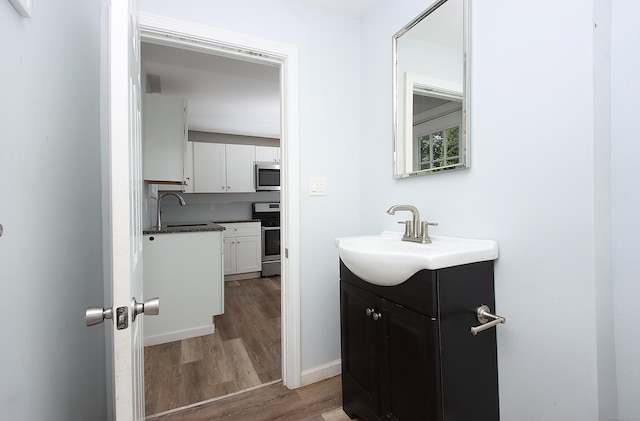 5 Golden Hill Ave, Danbury, CT 06811 - bathroom featuring vanity and wood finished floors
