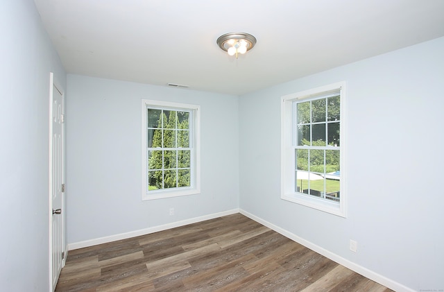5 Golden Hill Ave, Danbury, CT 06811 - spare room featuring healthy amount of natural light and wood finished floors