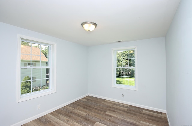 5 Golden Hill Ave, Danbury, CT 06811 - empty room featuring wood finished floors and baseboards