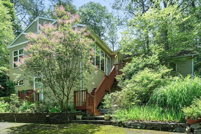 29 Carol St, Danbury, CT 06810 - view of side of home with stairs and a wooden deck
