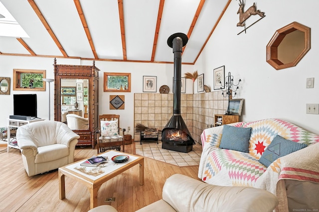 29 Carol St, Danbury, CT 06810 - living area with wood finished floors and a wood stove