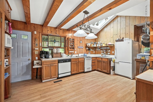 29 Carol St, Danbury, CT 06810 - kitchen with white appliances, wood walls, open shelves, light wood-style flooring, and light countertops