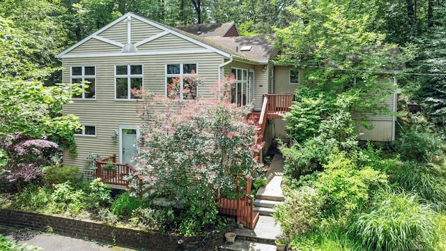29 Carol St, Danbury, CT 06810 - rear view of property featuring a deck and a shingled roof