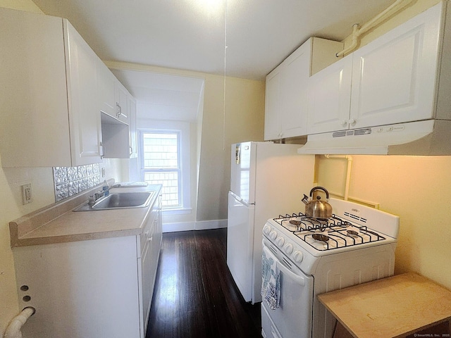 12 Arlington St, West Haven, CT 06516 - kitchen with under cabinet range hood, white gas range, dark wood-style floors, white cabinets, and light countertops