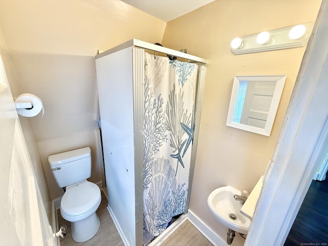 12 Arlington St, West Haven, CT 06516 - bathroom with a shower with curtain and wood finished floors