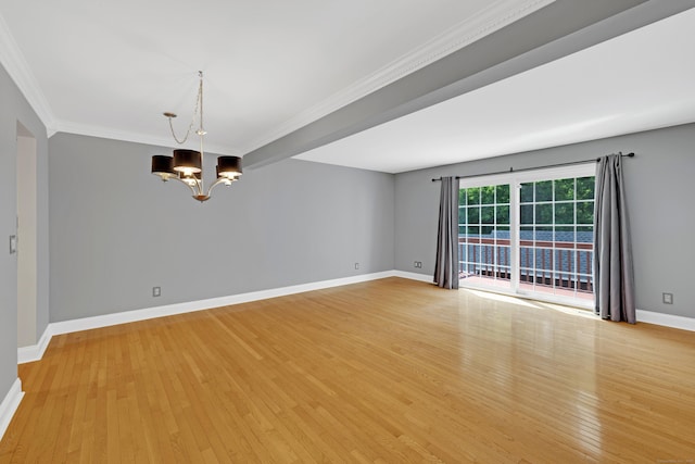 97 Park Ave Unit 70, Danbury, CT 06810 - unfurnished room with a chandelier, light wood-style flooring, and crown molding