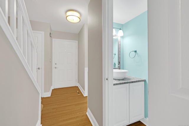 97 Park Ave Unit 70, Danbury, CT 06810 - hallway featuring a sink and light wood finished floors