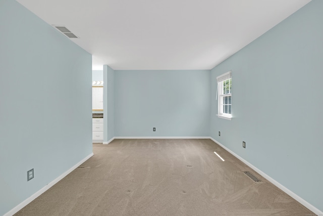 97 Park Ave Unit 70, Danbury, CT 06810 - carpeted empty room featuring baseboards