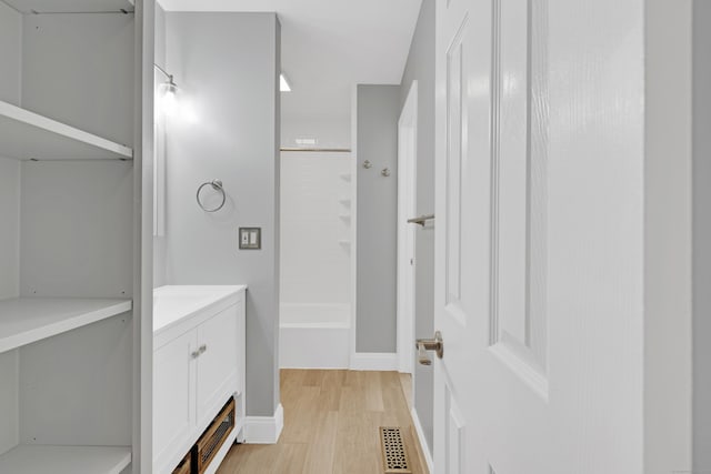 97 Park Ave Unit 70, Danbury, CT 06810 - full bathroom featuring wood finished floors, vanity, and washtub / shower combination