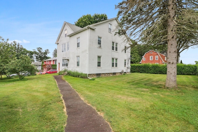 8 Garden St, Naugatuck, CT 06770 - view of side of home featuring a lawn