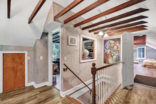 680 Wheelers Farms Rd, Milford, CT 06461 - staircase featuring wood finished floors and radiator
