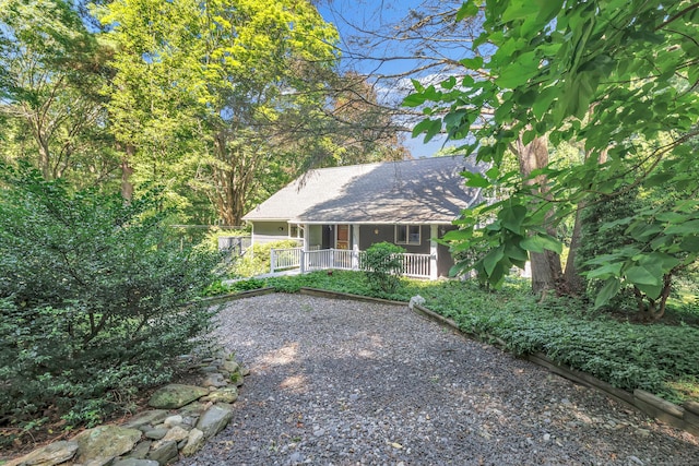 680 Wheelers Farms Rd, Milford, CT 06461 - view of front facade featuring covered porch and roof with shingles
