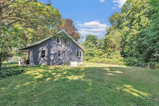 680 Wheelers Farms Rd, Milford, CT 06461 - view of side of home featuring a lawn