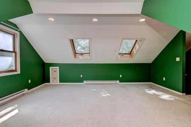 22 E Woods Rd, Roxbury, CT 06783 - additional living space featuring a baseboard radiator, a skylight, carpet floors, vaulted ceiling, and recessed lighting