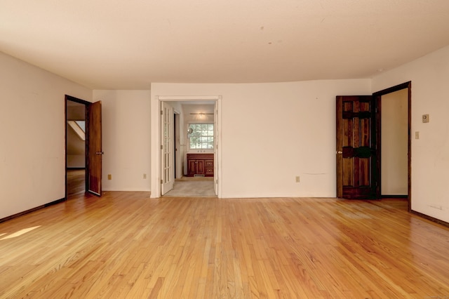 22 E Woods Rd, Roxbury, CT 06783 - empty room featuring light wood-type flooring and baseboards