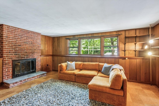 128 Carriage Dr, Avon, CT 06001 - living area with wooden walls and a brick fireplace