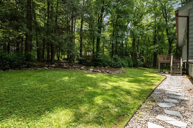 128 Carriage Dr, Avon, CT 06001 - view of green lawn featuring stairway and a wooden deck