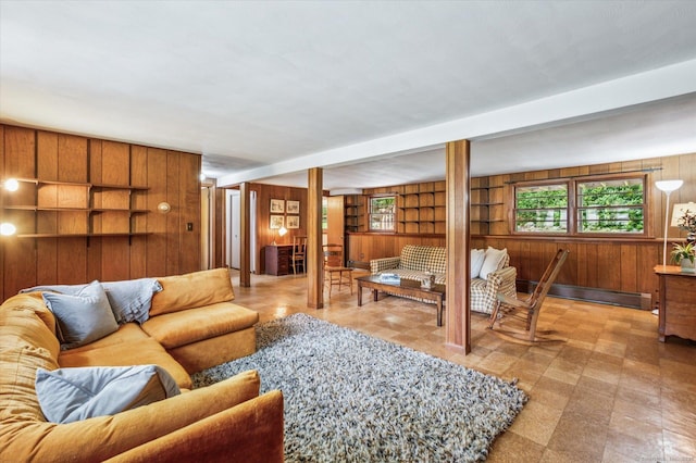 128 Carriage Dr, Avon, CT 06001 - living area featuring wood walls, tile patterned floors, beamed ceiling, and built in features